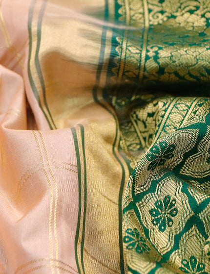 Pure gadwal silk saree pastel peach and green with allover zari checked pattern & zari buttas and zari woven border