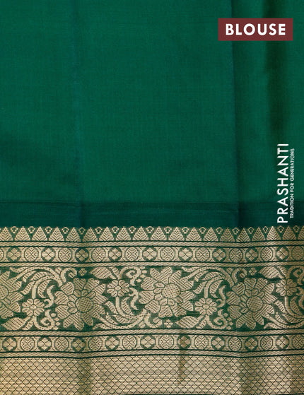 Pure gadwal silk saree pastel peach and green with allover zari checked pattern & zari buttas and zari woven border