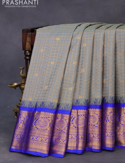 Pure gadwal silk saree grey and blue with allover zari checked pattern & zari buttas and temple design zari woven border