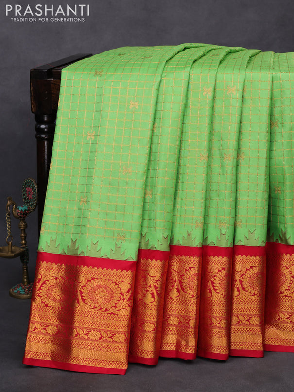 Pure gadwal silk saree pastel green and red with allover zari woven checked pattern and temple design floral zari woven border