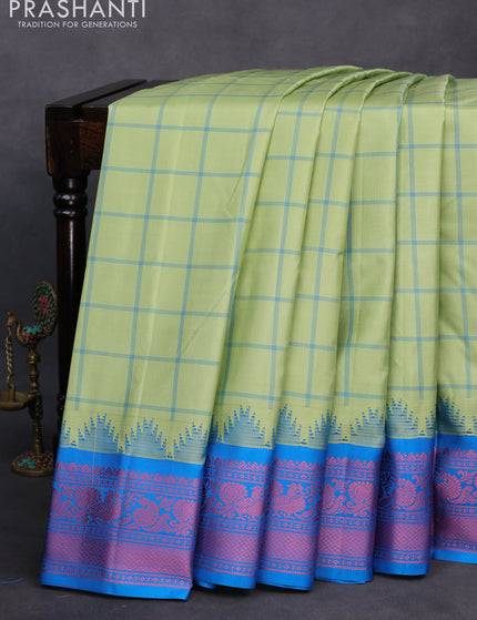 Pure gadwal silk saree pastel green and cs blue with allover checked pattern and thread woven border