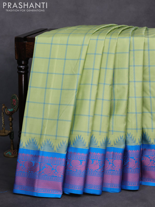 Pure gadwal silk saree pastel green and cs blue with allover checked pattern and thread woven border