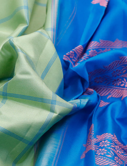 Pure gadwal silk saree pastel green and cs blue with allover checked pattern and thread woven border