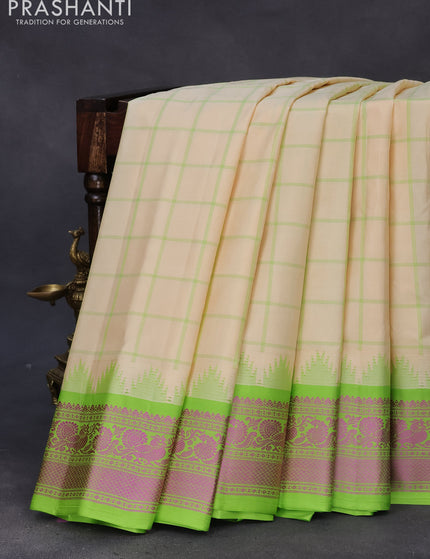 Pure gadwal silk saree cream and light green with allover checked pattern and thread woven border