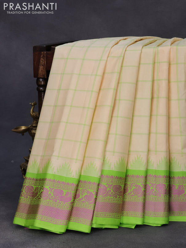 Pure gadwal silk saree cream and light green with allover checked pattern and thread woven border