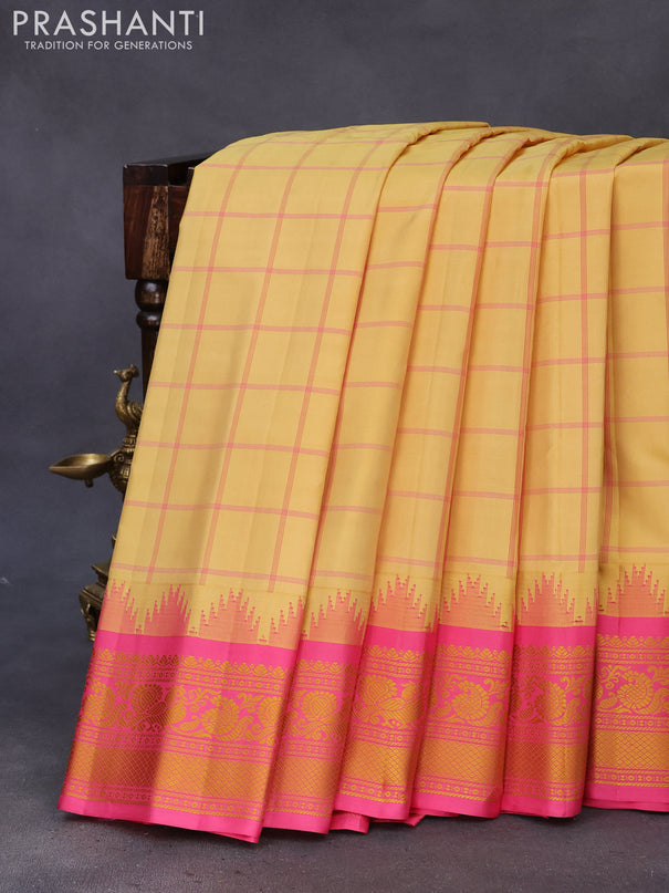 Pure gadwal silk saree sandal and pink with allover checked pattern and thread woven border