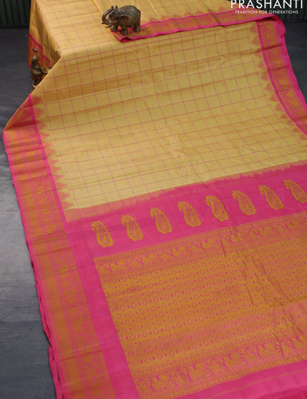 Pure gadwal silk saree sandal and pink with allover checked pattern and thread woven border