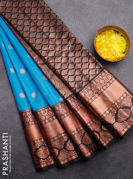 Semi gadwal saree blue and black with copper zari woven buttas and long zari woven border