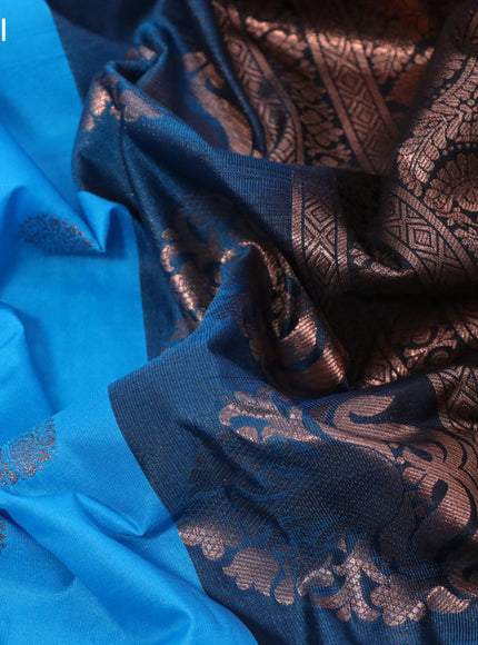 Semi gadwal saree blue and black with copper zari woven buttas and long zari woven border