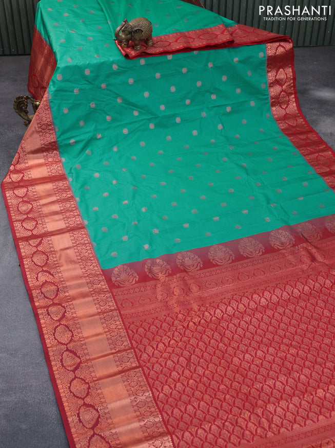 Semi gadwal saree teal green and red with copper zari woven buttas and temple design long zari woven border