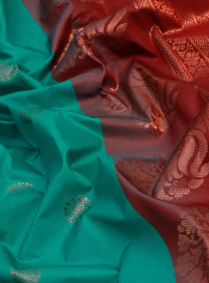 Semi gadwal saree teal green and red with copper zari woven buttas and temple design long zari woven border