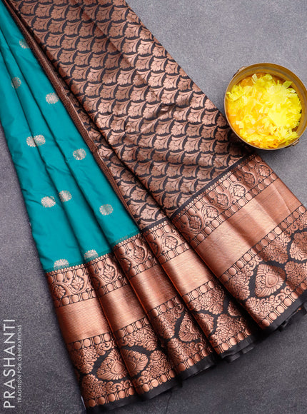 Semi gadwal saree teal blue and black with copper zari woven buttas and temple design long zari woven border