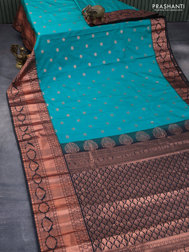 Semi gadwal saree teal blue and black with copper zari woven buttas and temple design long zari woven border