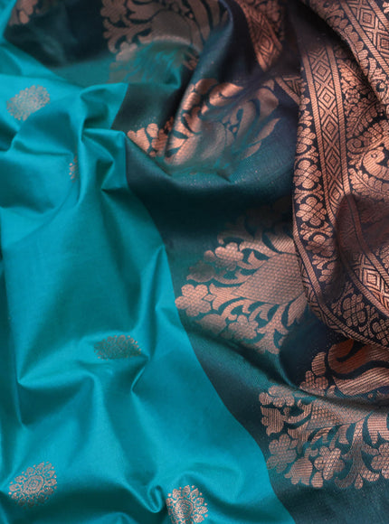 Semi gadwal saree teal blue and black with copper zari woven buttas and temple design long zari woven border