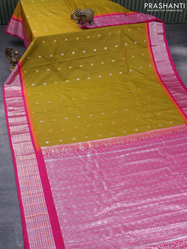 Semi gadwal saree mehendi green and pink with zari woven buttas and temple design zari woven border