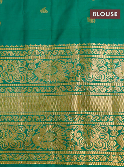 Semi gadwal saree blue and green with allover stripes pattern and temple design long zari woven border