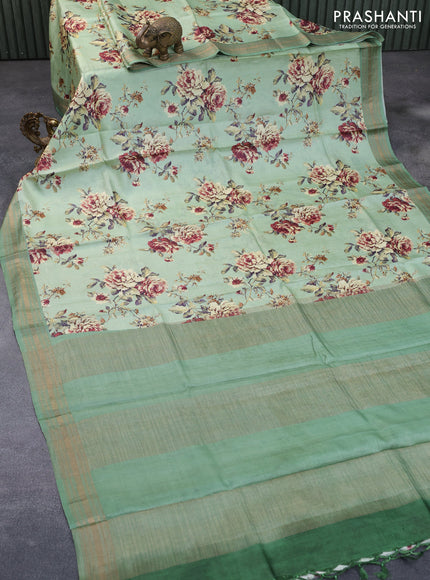 Pure tussar silk saree pastel green with allover floral prints and zari woven border