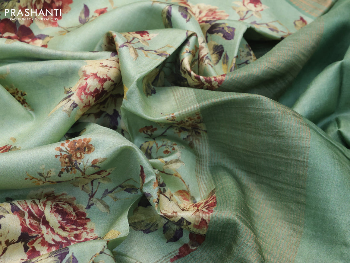 Pure tussar silk saree pastel green with allover floral prints and zari woven border