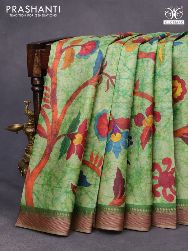 Pure tussar silk saree green shade with allover floral prints and zari woven border