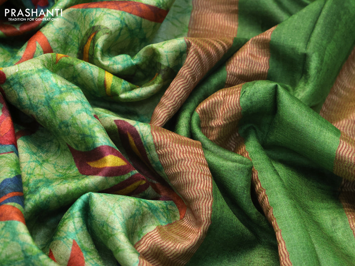 Pure tussar silk saree green shade with allover floral prints and zari woven border