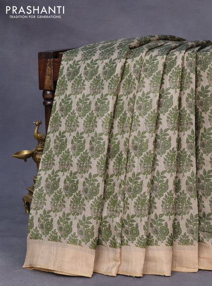 Pure tussar silk saree grey shade and sap green with allover floral prints and zari woven border