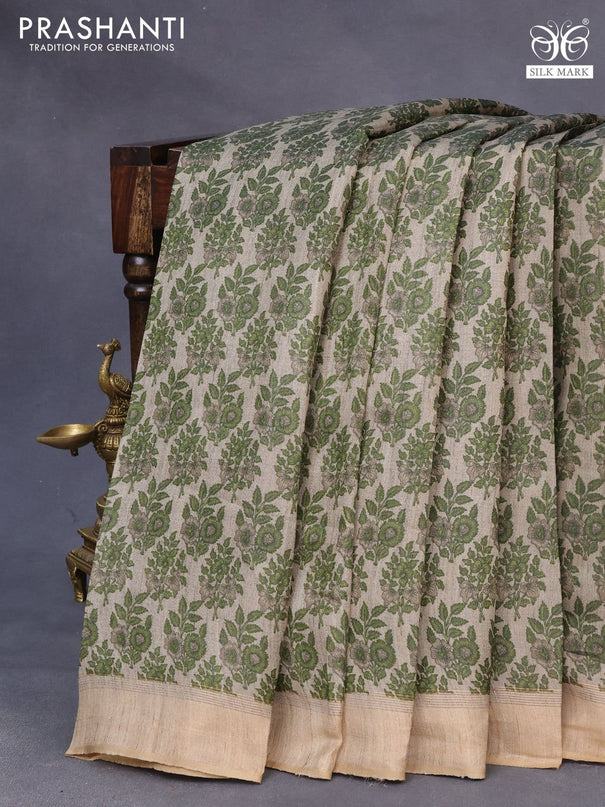 Pure tussar silk saree grey shade and sap green with allover floral prints and zari woven border