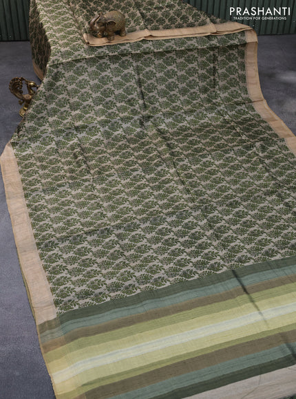 Pure tussar silk saree grey shade and sap green with allover floral prints and zari woven border