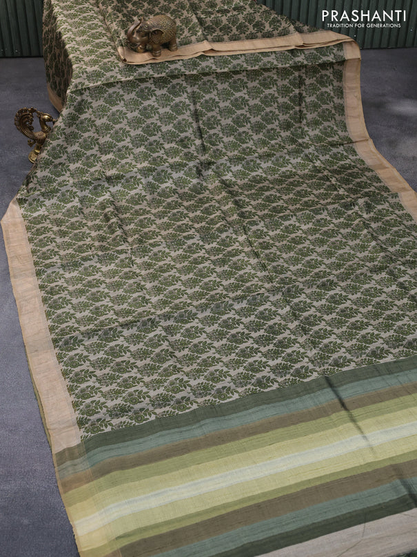 Pure tussar silk saree grey shade and sap green with allover floral prints and zari woven border