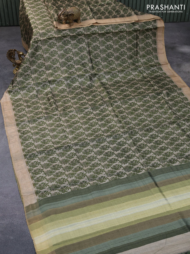 Pure tussar silk saree grey shade and sap green with allover floral prints and zari woven border