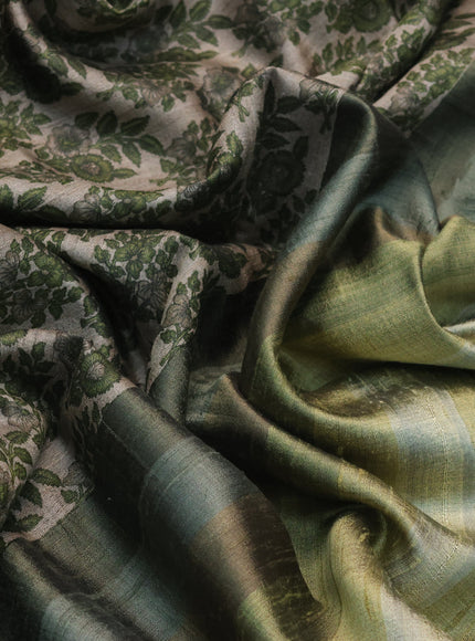 Pure tussar silk saree grey shade and sap green with allover floral prints and zari woven border