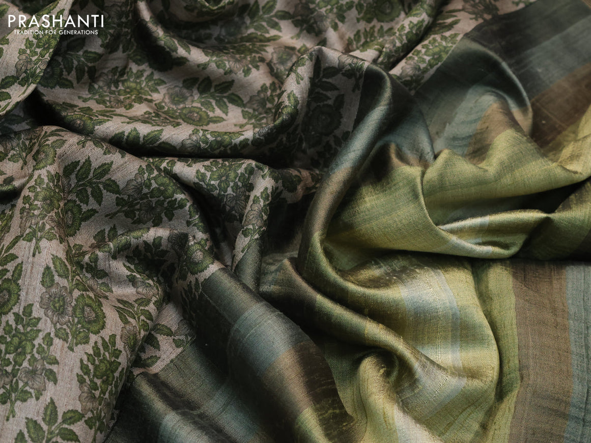 Pure tussar silk saree grey shade and sap green with allover floral prints and zari woven border