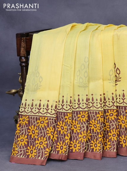 Bishnupuri silk saree yellow and brown with butta prints and printed border