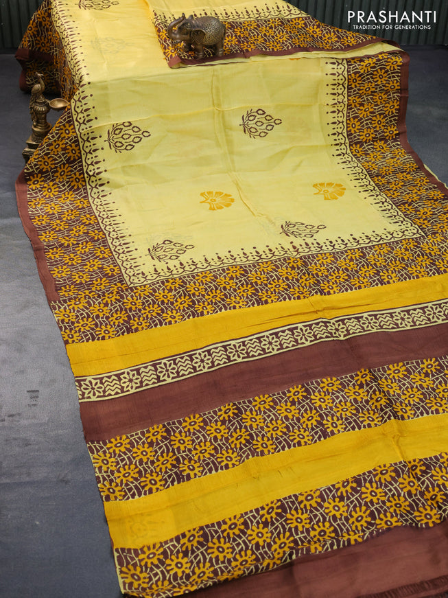 Bishnupuri silk saree yellow and brown with butta prints and printed border