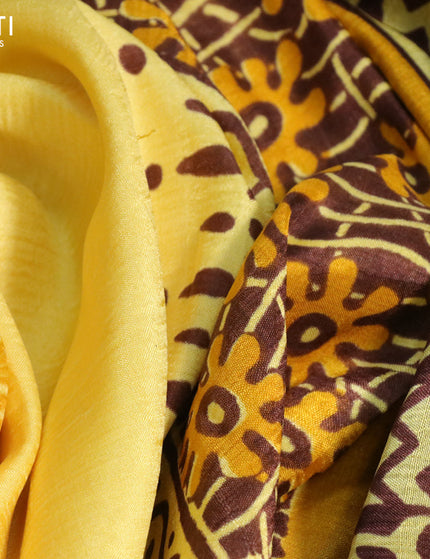 Bishnupuri silk saree yellow and brown with butta prints and printed border