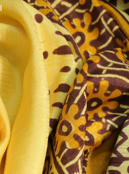 Bishnupuri silk saree yellow and brown with butta prints and printed border