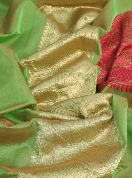 Kanjivaram silk cotton saree light green and maroon with woven buttas and rettapet zari woven border