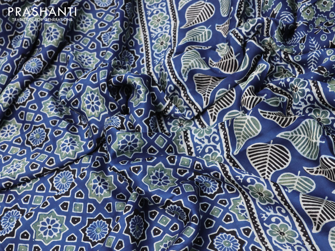 Modal silk saree blue and black with allover ajrakh prints and printed border