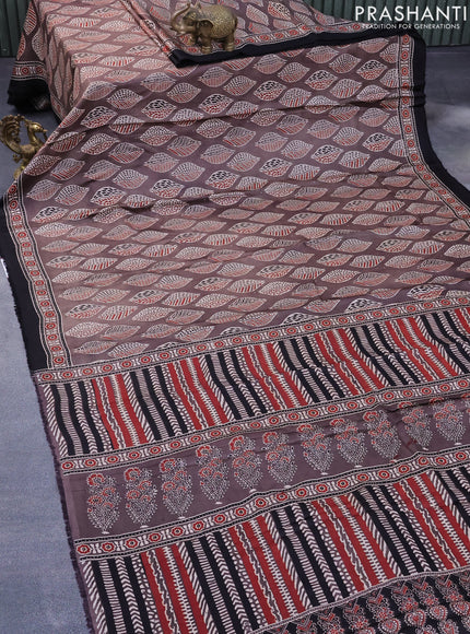 Modal silk saree brown and black with allover ajrakh prints and printed border