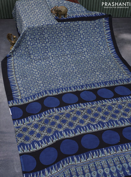 Modal silk saree blue and black with allover ajrakh prints and printed border