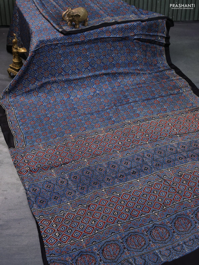 Modal silk saree blue and black with allover ajrakh prints and printed border