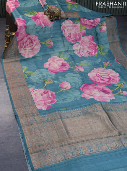 Banarasi tussar silk saree teal blue shade with allover floral digital prints and banarasi style border