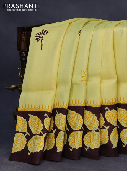 Bishnupuri silk saree yellow and brown with butta prints and printed border