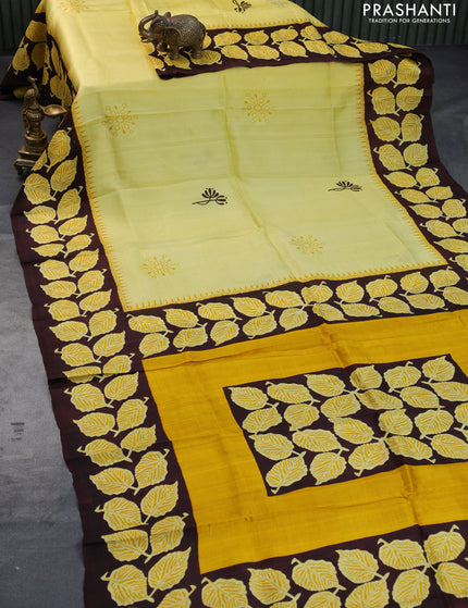 Bishnupuri silk saree yellow and brown with butta prints and printed border