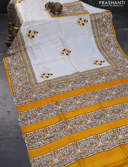 Bishnupuri silk saree off white and mustard yellow with plain body and printed border