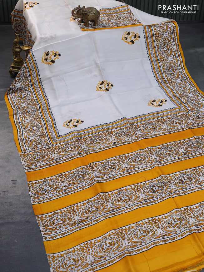 Bishnupuri silk saree off white and mustard yellow with plain body and printed border