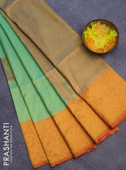 Semi soft silk saree dual shade of teal green and dual shade of mustard yellow with box type copper zari buttas and copper zari woven border