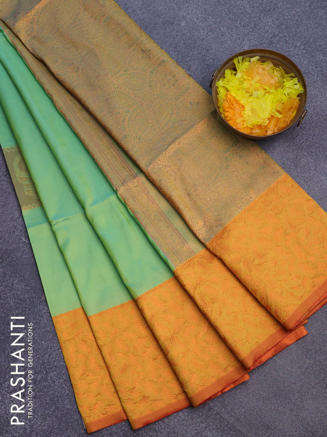 Semi soft silk saree dual shade of teal green and dual shade of mustard yellow with box type copper zari buttas and copper zari woven border