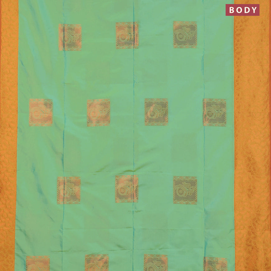 Semi soft silk saree dual shade of teal green and dual shade of mustard yellow with box type copper zari buttas and copper zari woven border