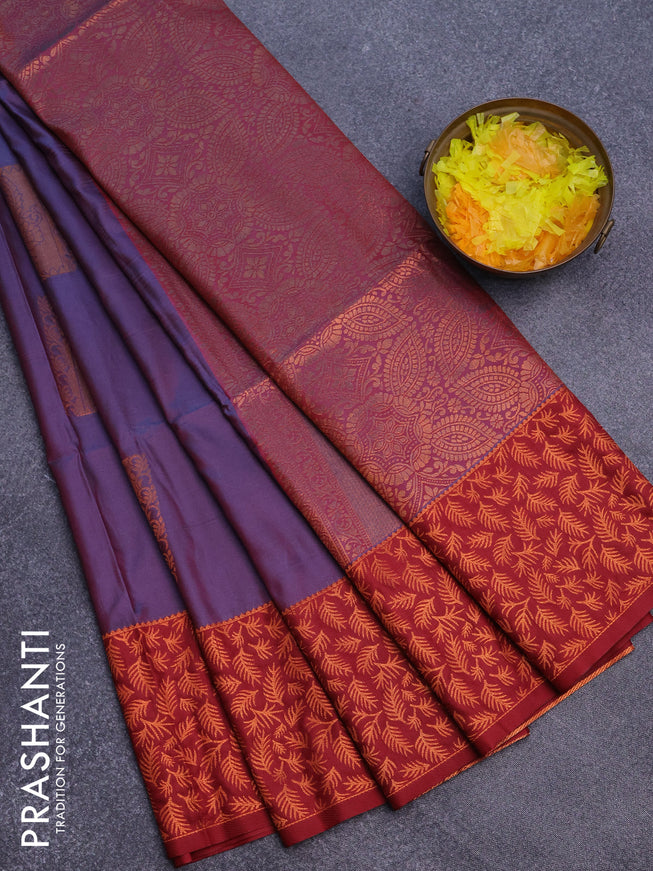 Semi soft silk saree dual shade of bluish red and maroon with box type copper zari buttas and copper zari woven border