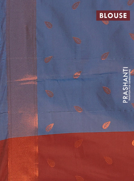 Semi soft silk saree dual shade of blue and rust shade with copper zari woven leaf buttas and copper zari woven border